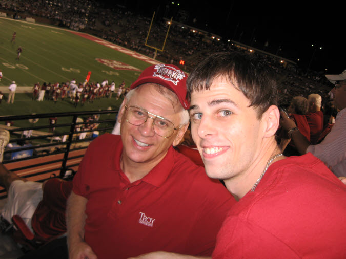 25/28 John and son Joe at Troy game in 2008