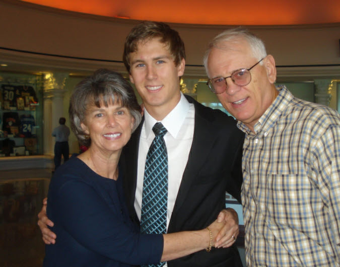 25/28 John and son Joe at Troy game in 2008