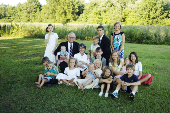 28/28 John and Dianne with their 17 grandchildren, June 2010