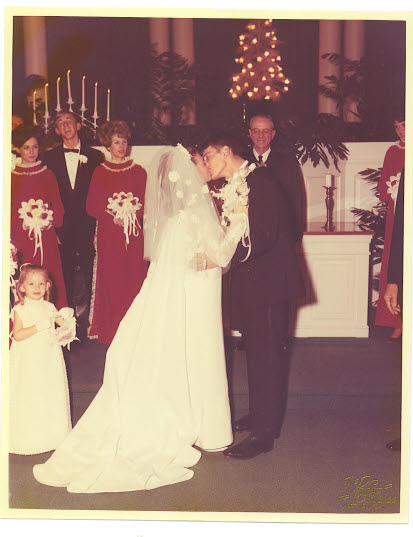 3/28 1968 John and Dianne share a wedding kiss